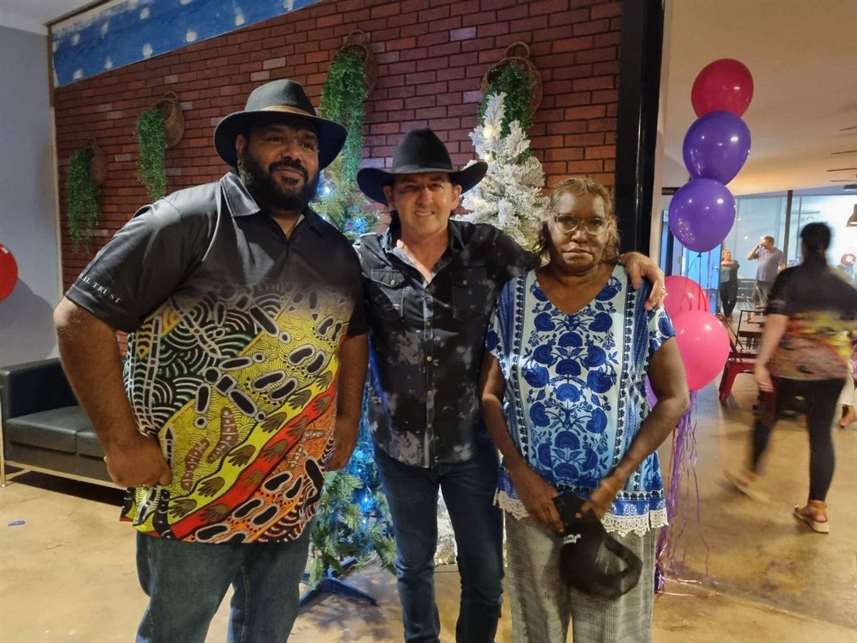 Bradley with Lee Kernaghan and a friend at a Christmas event
